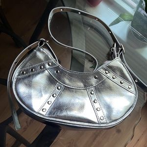 Silver Medium Handbag. Love this bag, fits my phone plus more.